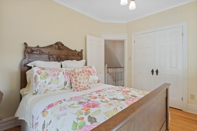 Professional real estate photographer capturing an interior shot of a modern home with a wide-angle lens.
